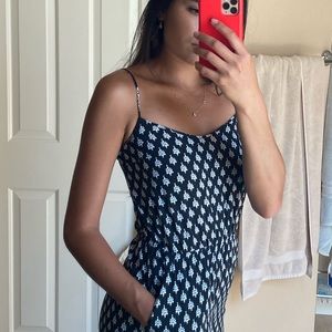 Divided- long romper with pockets